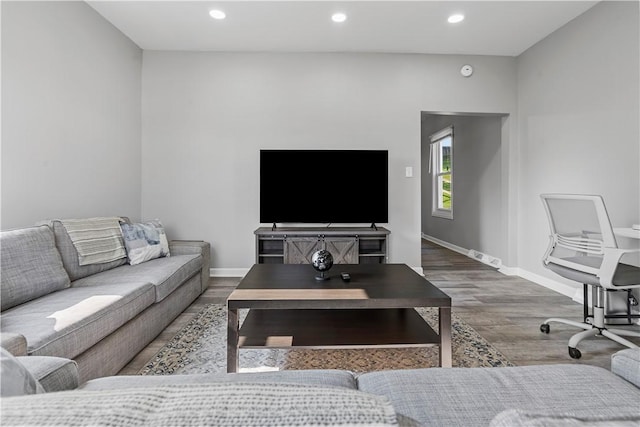 101 Flora St, Brighton Heights, PA 15212 - living room featuring wood finished floors, baseboards, and recessed lighting