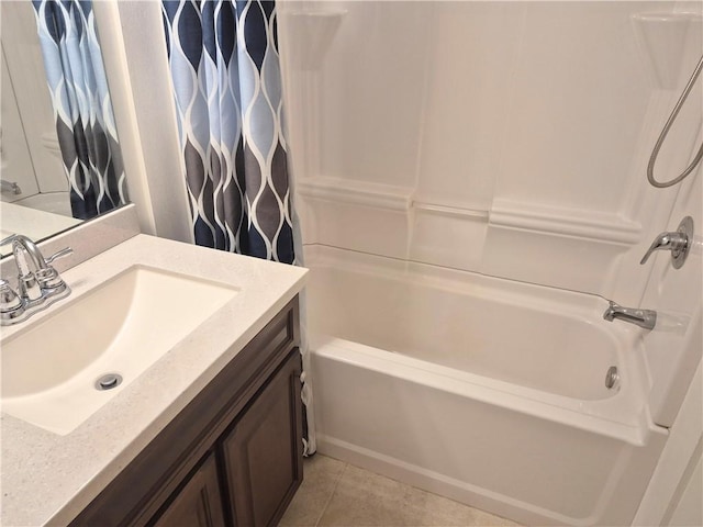 bathroom with shower / bath combination with curtain, tile patterned flooring, and vanity