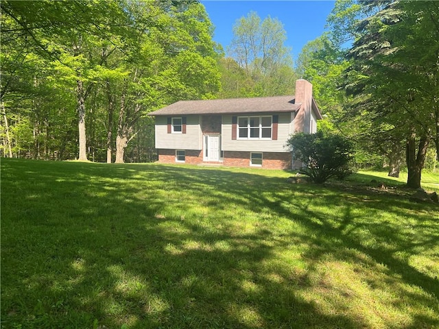 150 Long Hill Rd, Salem Twp Mer, PA 16130 - split foyer home with a chimney and a front lawn