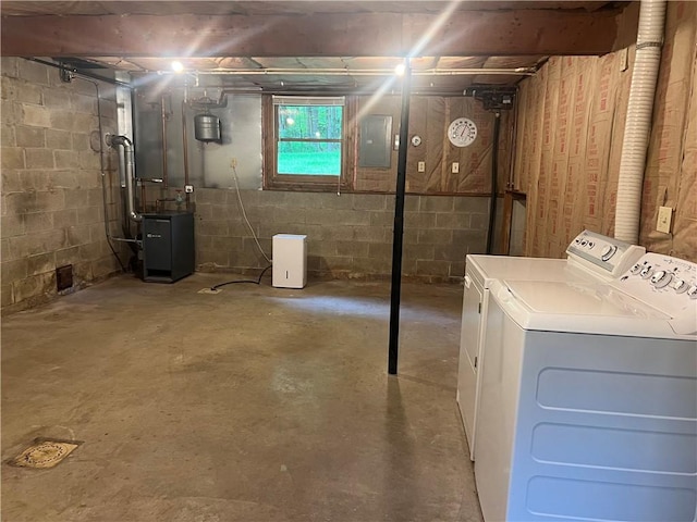 150 Long Hill Rd, Salem Twp Mer, PA 16130 - basement featuring washer and clothes dryer, electric panel, and a heating unit