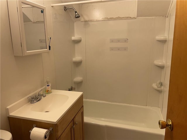bathroom featuring vanity and washtub / shower combination