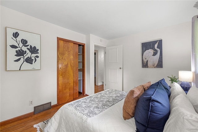 318 Milbren Dr, Penn Hills, PA 15147 - bedroom with wood finished floors, baseboards, and a closet