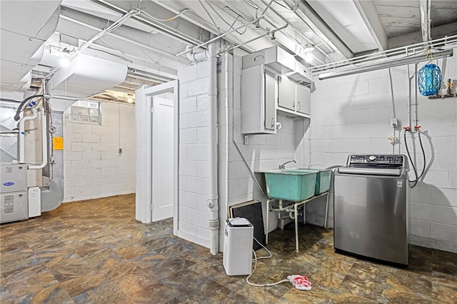 318 Milbren Dr, Penn Hills, PA 15147 - unfinished basement featuring washer / dryer, heating unit, and a sink