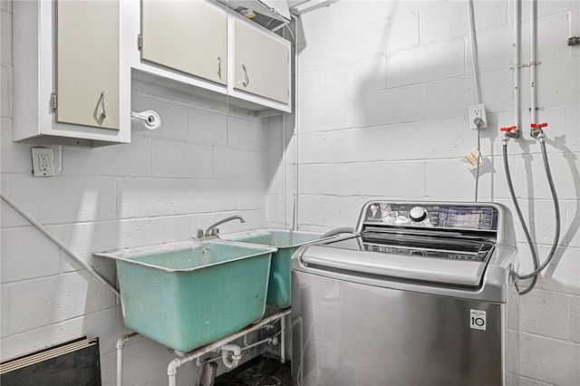 318 Milbren Dr, Penn Hills, PA 15147 - clothes washing area with washer / clothes dryer, cabinet space, and concrete block wall