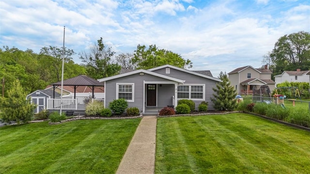 13 Chestnut St, South Fayette, PA 15082 - view of front of home with a gazebo, a storage shed, an outdoor structure, and covered porch