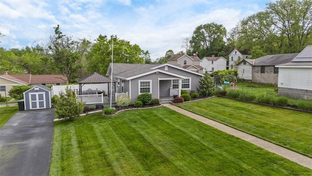 13 Chestnut St, South Fayette, PA 15082 - view of front of property featuring a gazebo, a storage shed, an outbuilding, and a porch