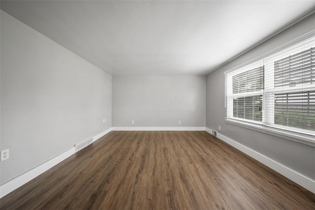 13 Chestnut St, South Fayette, PA 15082 - spare room with dark wood-style flooring and baseboards