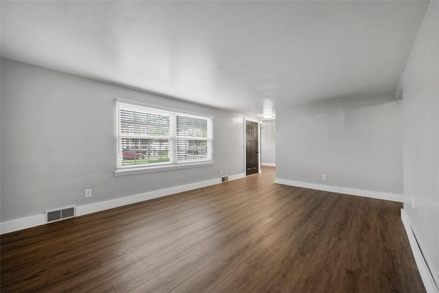 13 Chestnut St, South Fayette, PA 15082 - unfurnished room with dark wood-type flooring, baseboards, and baseboard heating