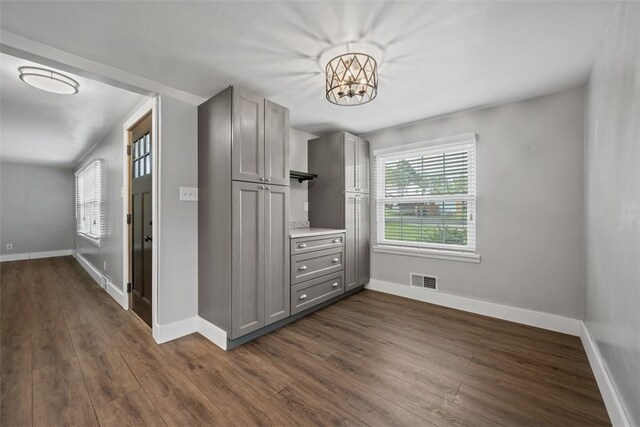 13 Chestnut St, South Fayette, PA 15082 - interior space featuring baseboards, dark wood-type flooring, and multiple windows