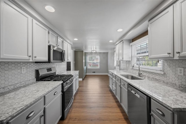 13 Chestnut St, South Fayette, PA 15082 - kitchen with appliances with stainless steel finishes, a sink, gray cabinets, baseboards, and recessed lighting