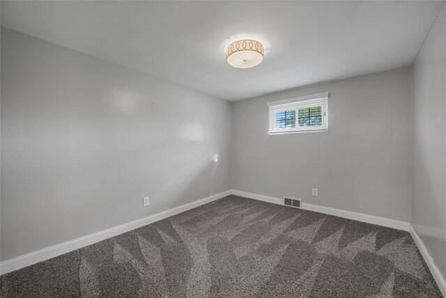13 Chestnut St, South Fayette, PA 15082 - unfurnished room with dark colored carpet and baseboards