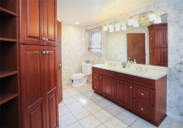 107 Great Oaks Dr, Moon/Crescent Twp, PA 15108 - full bathroom featuring wallpapered walls, toilet, tile patterned floors, double vanity, and baseboards