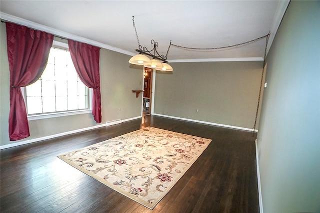 107 Great Oaks Dr, Moon/Crescent Twp, PA 15108 - dining area with crown molding, wood finished floors, and baseboards