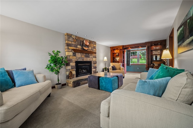 living room with carpet floors, a fireplace, and baseboards
