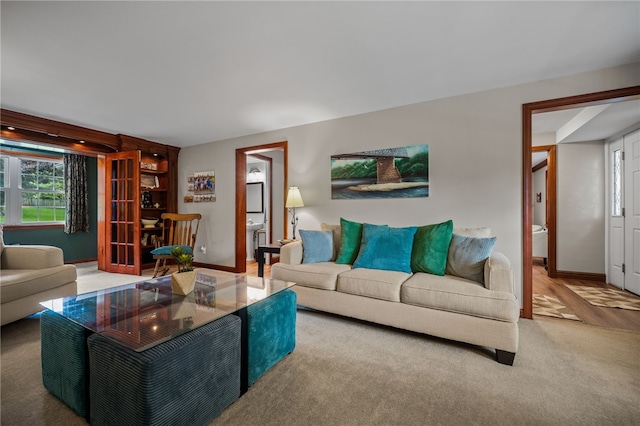 living room featuring baseboards