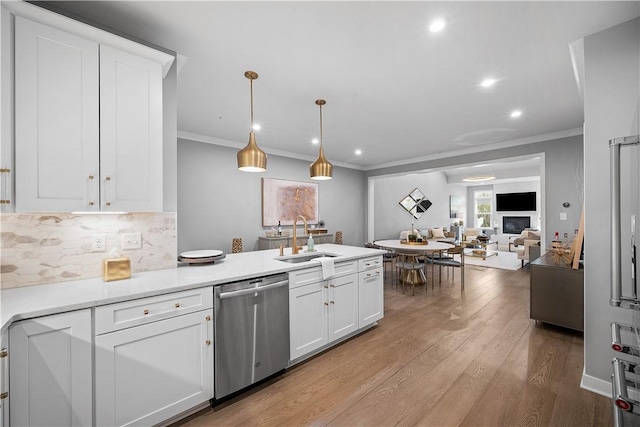 3033 Mahican Cir, Marshall, PA 16046 - kitchen with dishwasher, a sink, crown molding, a peninsula, and white cabinets