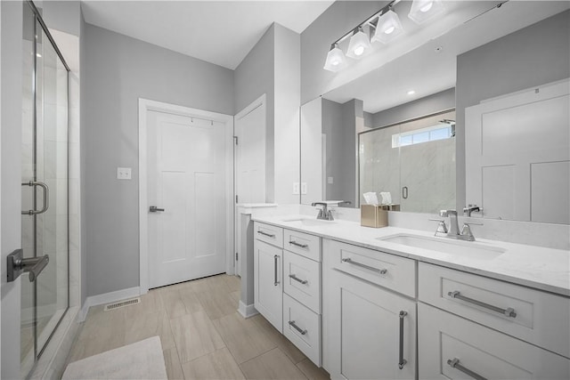 3033 Mahican Cir, Marshall, PA 16046 - full bath featuring a shower stall, double vanity, and baseboards