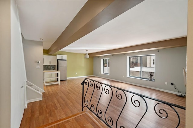 5708 Walnut Unit B2, Shadyside, PA 15232 - corridor featuring light wood-type flooring, baseboards, and beam ceiling