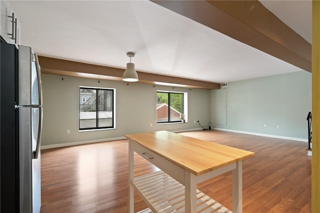 5708 Walnut Unit B2, Shadyside, PA 15232 - unfurnished living room featuring wood finished floors and baseboards