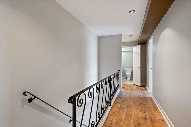 5708 Walnut Unit B2, Shadyside, PA 15232 - corridor featuring light wood-style floors, baseboards, and an upstairs landing