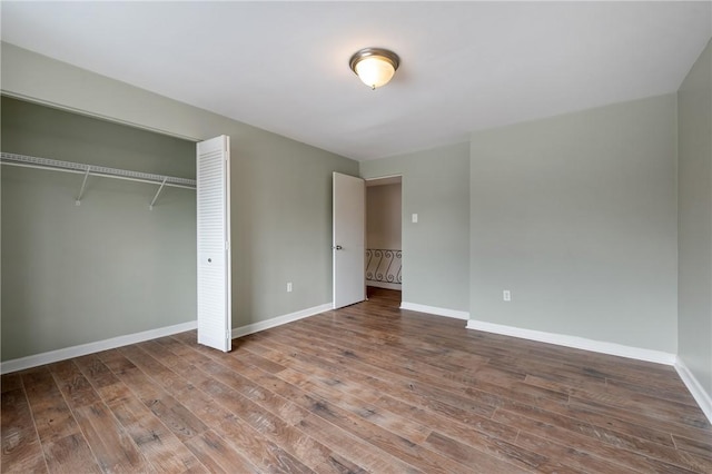 5708 Walnut Unit B2, Shadyside, PA 15232 - unfurnished bedroom featuring wood finished floors, baseboards, and a closet