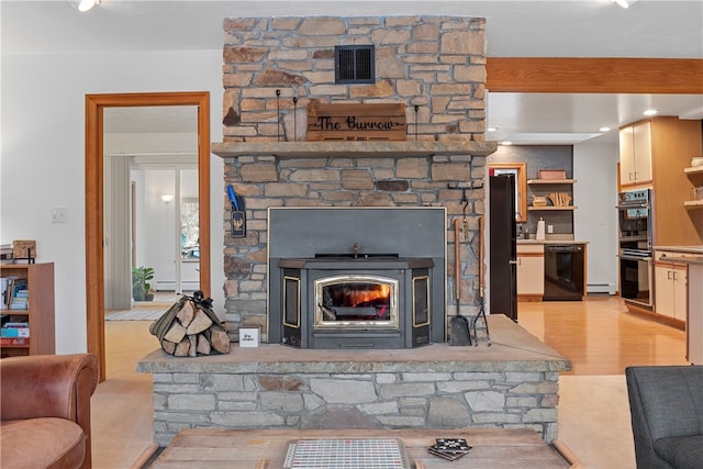 147 Crimson Oak Rd, Jefferson Twp Som, PA 15501 - living area featuring light wood-style floors and a baseboard heating unit