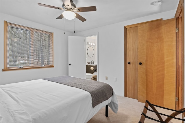 147 Crimson Oak Rd, Jefferson Twp Som, PA 15501 - carpeted bedroom with a closet, a ceiling fan, and ensuite bath