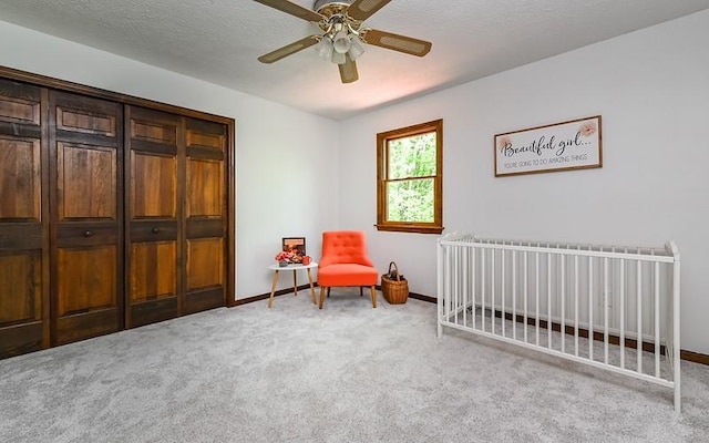 bedroom with carpet floors, baseboards, and ceiling fan