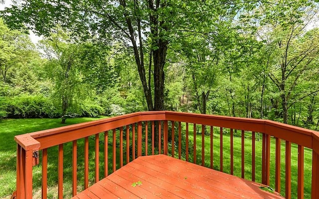deck featuring a lawn