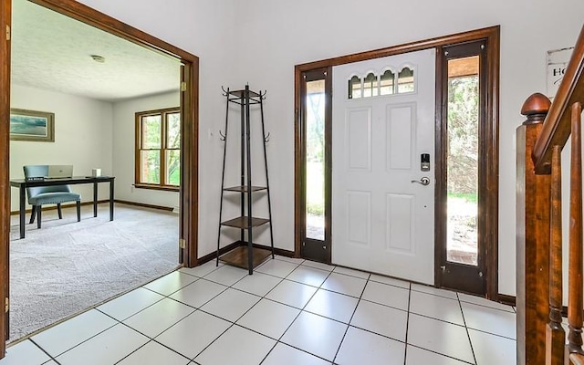3820 Grove Rd, Richland, PA 15044 - entryway with light carpet, baseboards, and light tile patterned floors