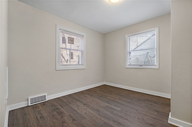 2357 Pitcairn Rd, Monroeville, PA 15146 - spare room featuring dark wood finished floors and baseboards