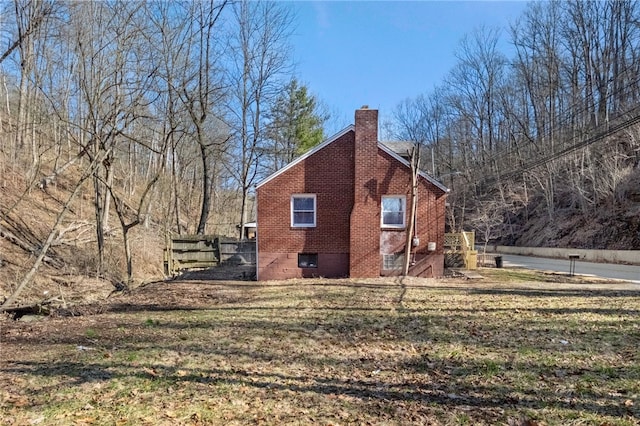 2357 Pitcairn Rd, Monroeville, PA 15146 - view of property exterior featuring a chimney and brick siding