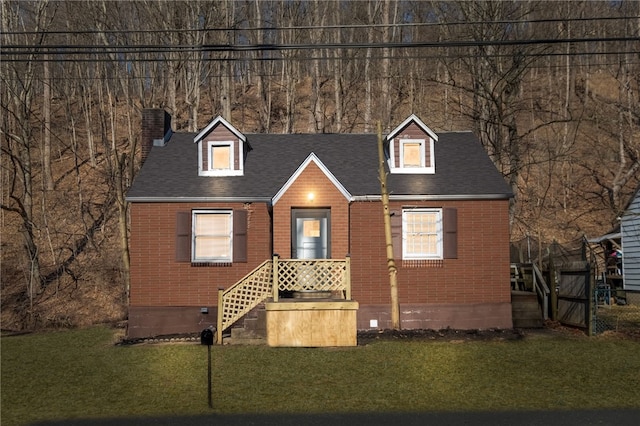 2357 Pitcairn Rd, Monroeville, PA 15146 - new england style home featuring brick siding, a chimney, and a front lawn