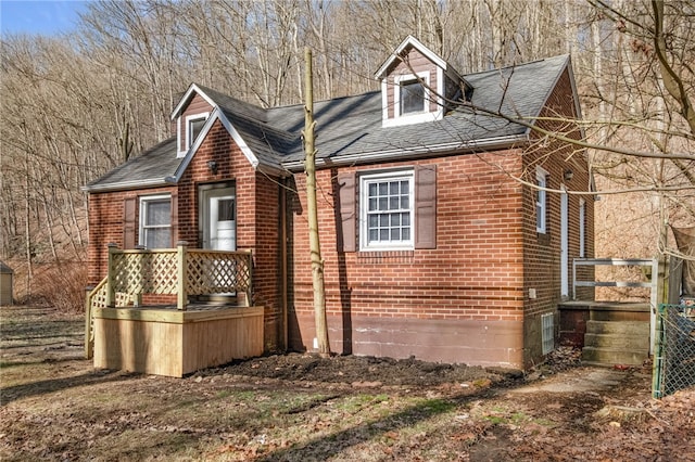 2357 Pitcairn Rd, Monroeville, PA 15146 - view of home's exterior featuring brick siding and roof with shingles