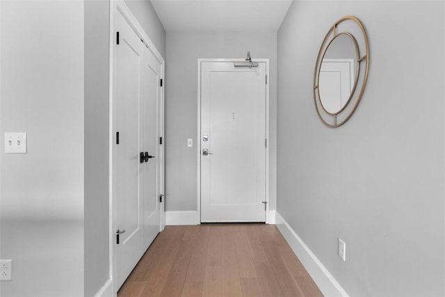 350 Oliver Ave Unit 1203, Downtown Pgh, PA 15222 - corridor featuring wood finished floors and baseboards