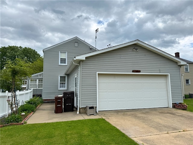 911 Columbia Ave, Grove City Boro, PA 16127 - back of property with driveway and a garage