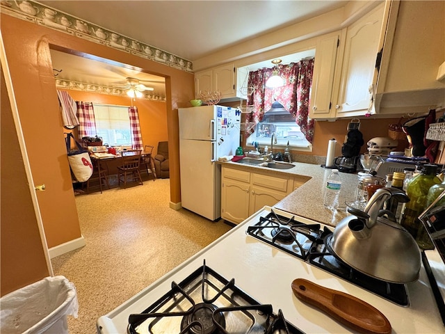 911 Columbia Ave, Grove City Boro, PA 16127 - kitchen with freestanding refrigerator, a sink, and light countertops