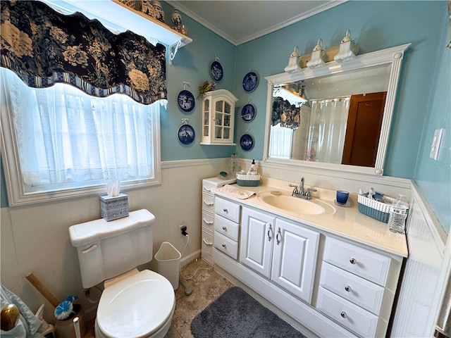 911 Columbia Ave, Grove City Boro, PA 16127 - bathroom with wainscoting, toilet, vanity, and ornamental molding