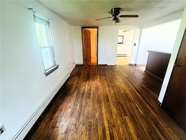 128 Cessna Hill Rd, Jenner Twp, PA 15531 - spare room with baseboard heating, hardwood / wood-style flooring, and a ceiling fan