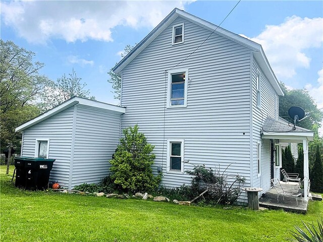 128 Cessna Hill Rd, Jenner Twp, PA 15531 - view of side of home featuring a yard