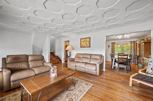 426 Oliver Dr, White Oak, PA 15131 - living area with light wood-style floors and stairway