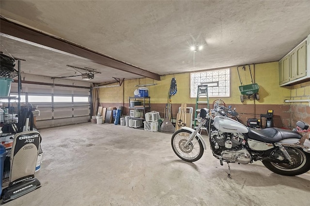 426 Oliver Dr, White Oak, PA 15131 - garage featuring a garage door opener