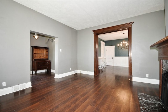 918 Arlington Prt, Vue, PA 15133 - unfurnished living room with wood finished floors, a chandelier, baseboards, and a premium fireplace