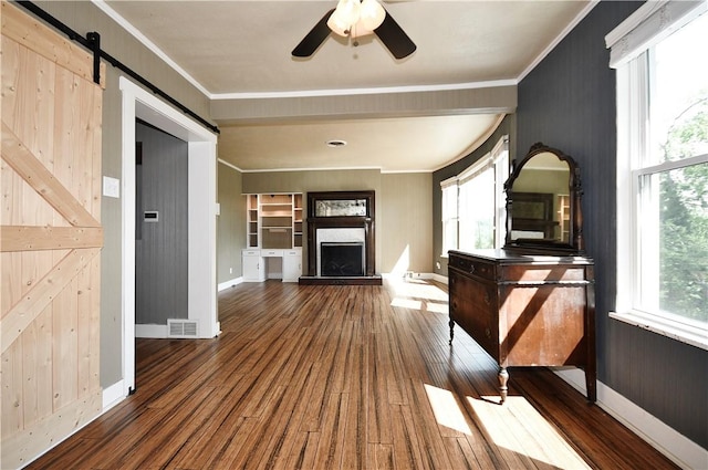 918 Arlington Prt, Vue, PA 15133 - unfurnished living room with wood finished floors, ornamental molding, ceiling fan, baseboards, and a fireplace with raised hearth