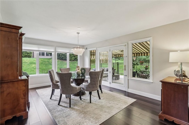 1231 Nicklaus Way W, Deer, PA 15044 - dining space featuring a chandelier, baseboards, and dark wood finished floors