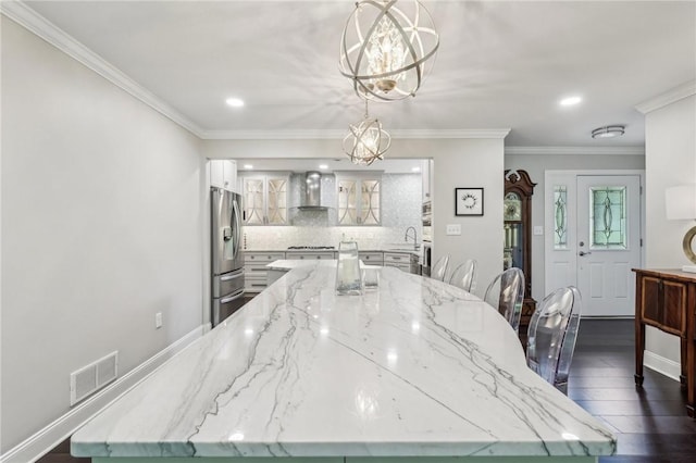 1231 Nicklaus Way W, Deer, PA 15044 - dining space with dark wood finished floors, crown molding, recessed lighting, and baseboards