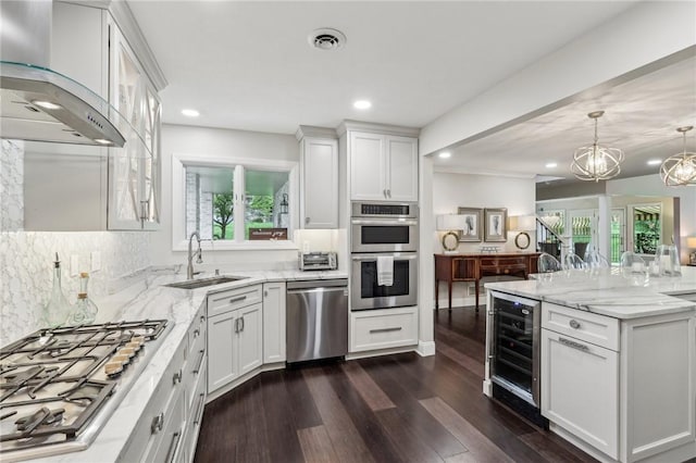 1231 Nicklaus Way W, Deer, PA 15044 - kitchen with stainless steel appliances, a sink, wine cooler, wall chimney exhaust hood, and dark wood-style floors