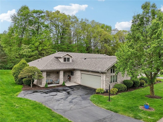 1231 Nicklaus Way W, Deer, PA 15044 - view of front of home with a front lawn, asphalt driveway, and roof with shingles