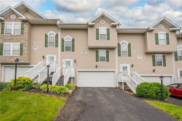 239 Mountain Dr, Carnegie, PA 15106 - townhome / multi-family property with an attached garage and asphalt driveway