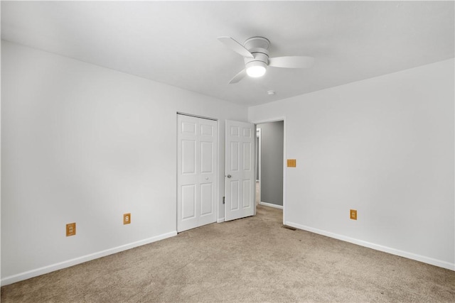 239 Mountain Dr, Carnegie, PA 15106 - unfurnished bedroom with light colored carpet, baseboards, a ceiling fan, and a closet
